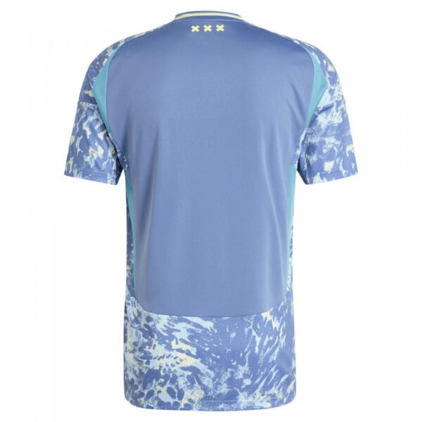 Back of the Ajax Amsterdam Away Jersey 24/25 displays a blue design with light blue and white abstract sleeve and lower back patterns, topped by three small yellow asterisks.