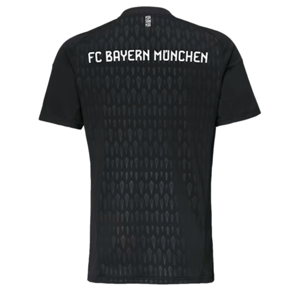 Back view of the Bayern Munich black Jersey 23/24, featuring white text on the upper back against a subtle patterned fabric design in sleek black.