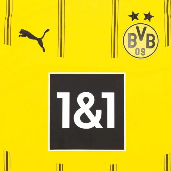 The Borussia Dortmund Home Jersey 24/25 features an iconic yellow design with the Puma logo on the left, the black BVB 09 emblem and two stars on the right, and a bold 1&1 sponsor logo in a sleek black rectangle at its center, merging tradition with style.