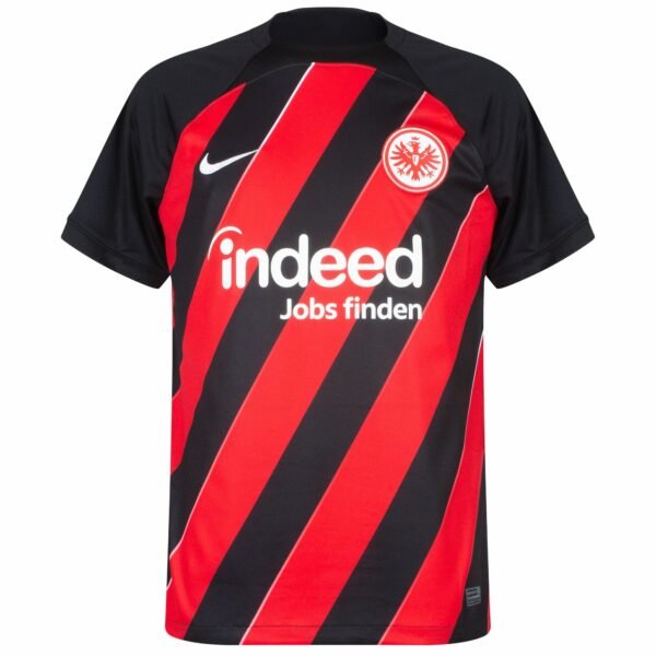The Eintracht Frankfurt Home Jersey 23/24 showcases bold black and red stripes with an eagle logo in a circle on the left chest, the Nike logo on the right, and Indeed Jobs finden prominently in white text across the front.