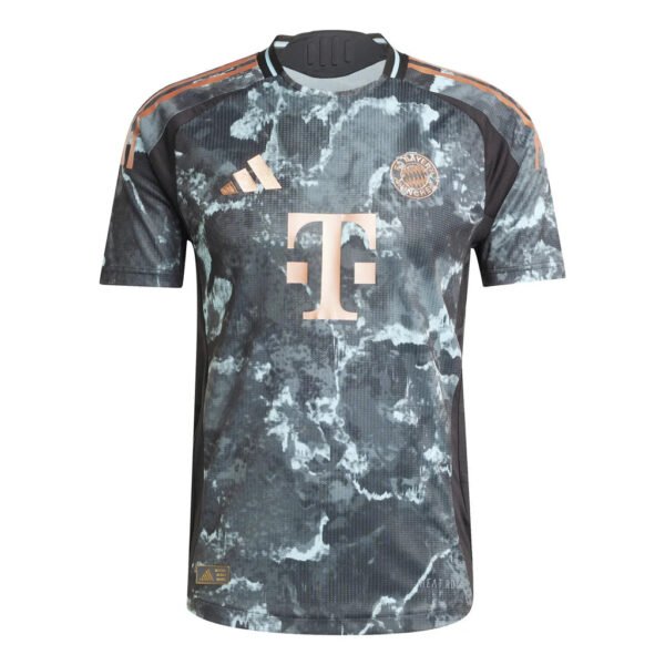 Front view of the FC Bayern Munich Away Jersey 24/25 with a grey and black marble pattern, copper accents, logos, and a central T emblem.