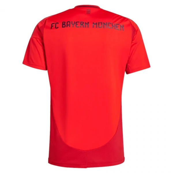 The FC Bayern Munich Home Jersey 24/25 prominently displays FC Bayern München on the back and includes subtle mesh accents for ventilation.