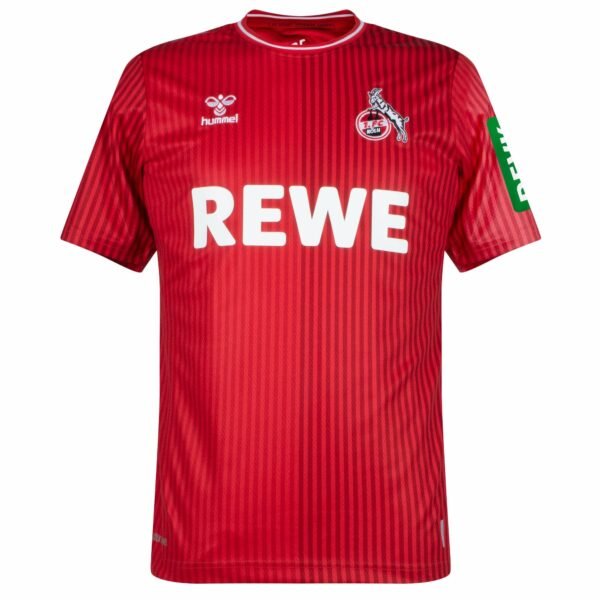 The FC Köln Away Jersey 23/24 is a red soccer jersey with subtle pinstripes, fc koln logo, hummel branding, and REWE in bold white letters on the chest. A green detail adorns the right sleeve.