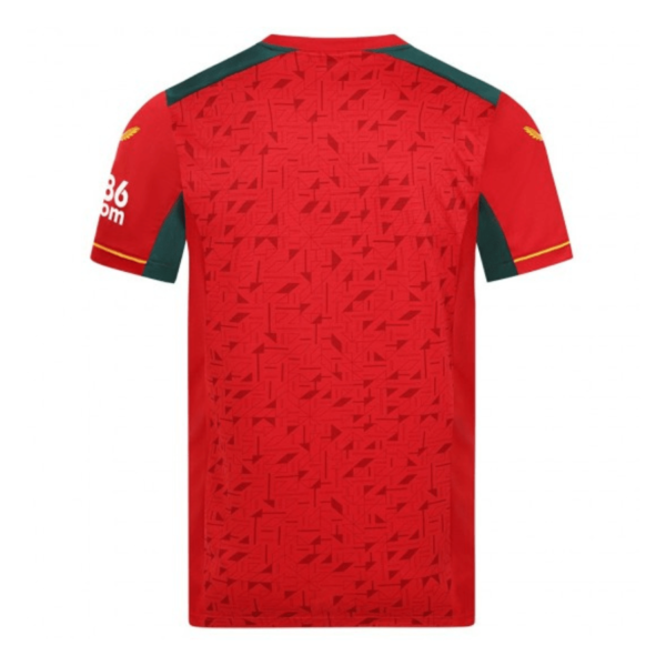 The back of the Wolverhampton Away Jersey 23/24 features dark green shoulders and sleeves on a red base, geometric patterns, a small sponsor logo on the right sleeve, and gold accents at the sleeve ends.