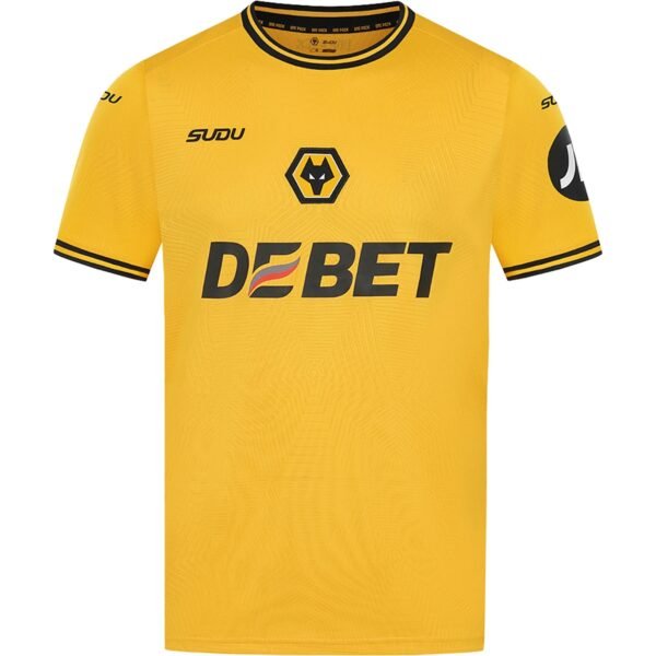 The Wolverhampton Home Jersey 24/25 - Fan Edition is yellow with a wolf logo in the center, DEBET branding on the front, and features black trim on the collar and cuffs. The words SUDU and a circular logo adorn the chest and sleeve.
