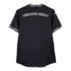 The Borussia Mönchengladbach Third Jersey 24/25 is a black sports jersey with Mönchengladbach in white on the back, and features sleek white striping on its sleeves and collar.