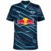 The RB Leipzig Third Jersey 24/25 is dark blue with turquoise diagonal stripes, featuring a Puma logo, club emblem, and a sponsor logo with two red bulls. It has a V-shaped collar lined in turquoise for a sleek finish.