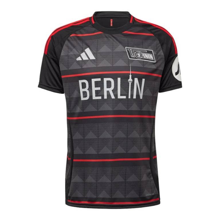 The Union Berlin Away Jersey 24/25 is a black and gray patterned football jersey with striking red accents, displaying BERLIN across the front. It features the team badge on the right chest and an Adidas logo on the left side.