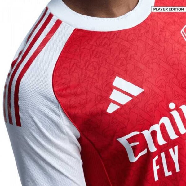 Adidas logo on Arsenal red kit Home 25-26